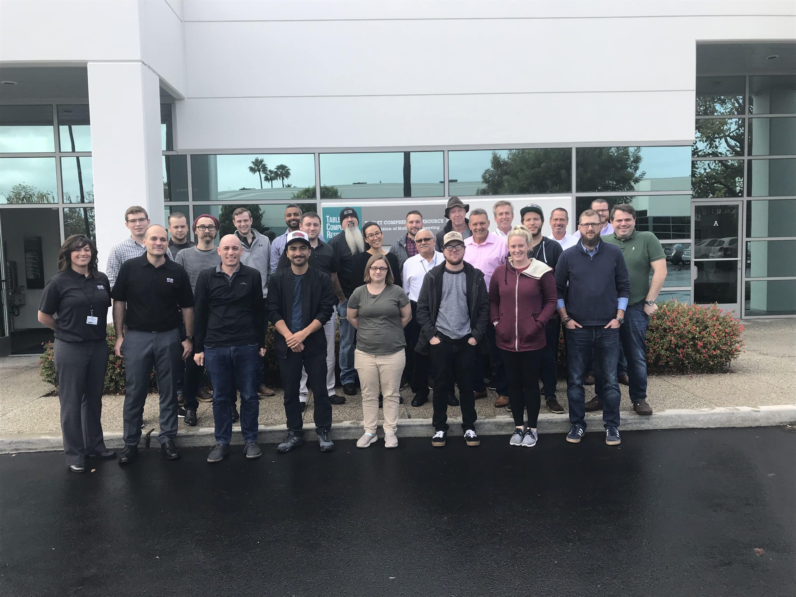 natoli engineering tablet manufacturing team and clients