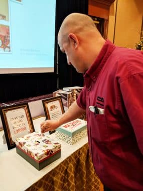 Natoli Engineering Worker Using Raffle Ticket at Christmas in 2018